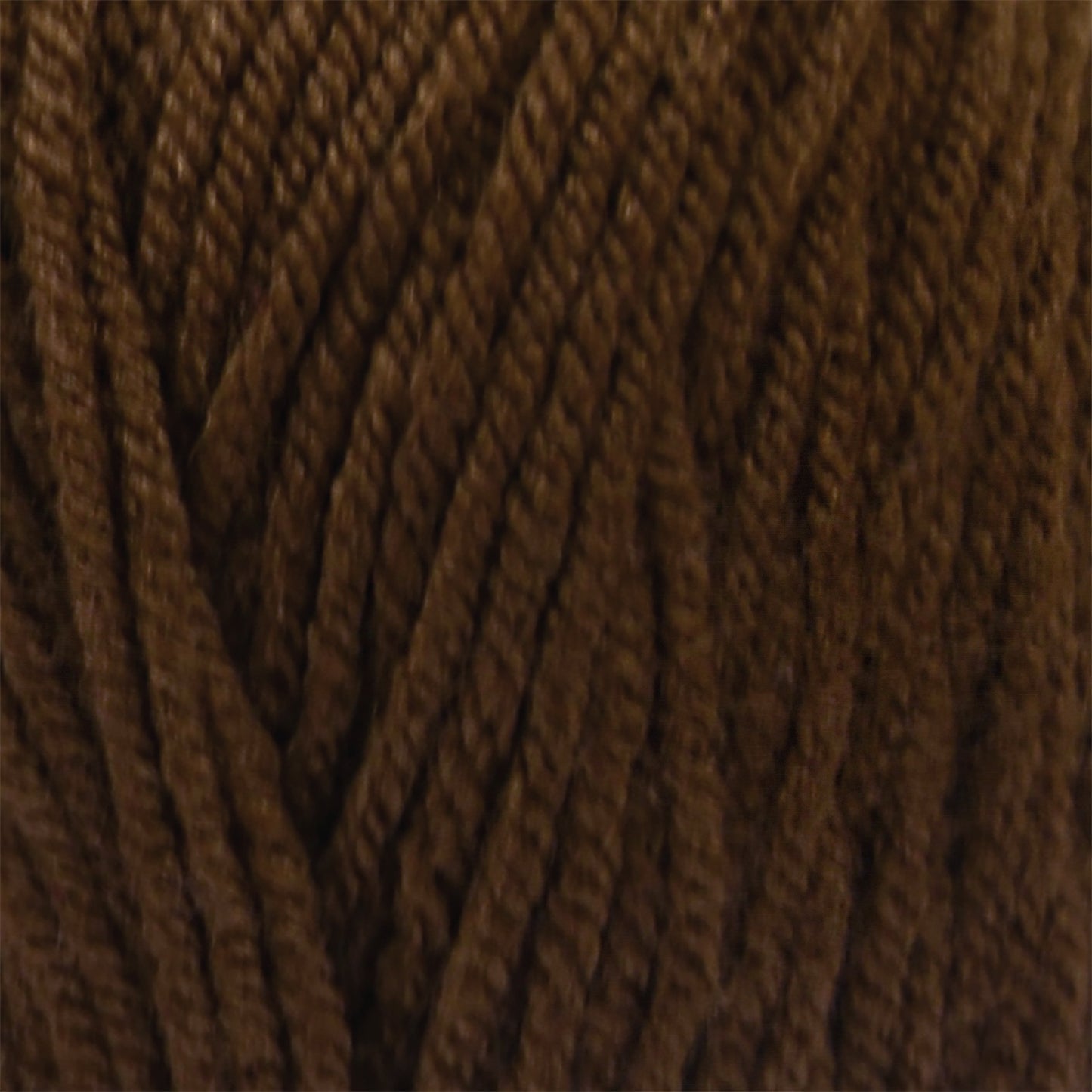 Close-up of brown yarn with a textured pattern