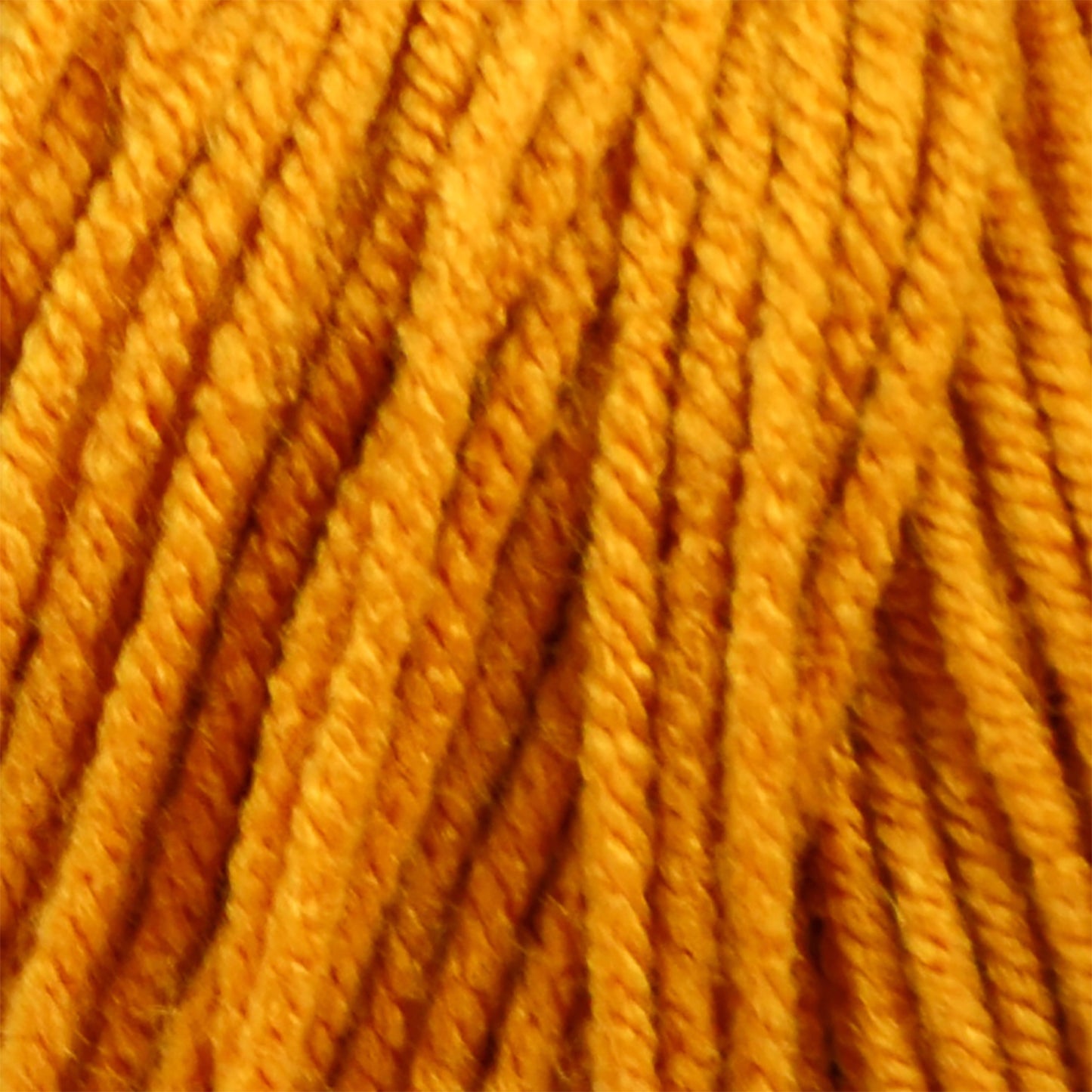 Close-up of bright orange yarn