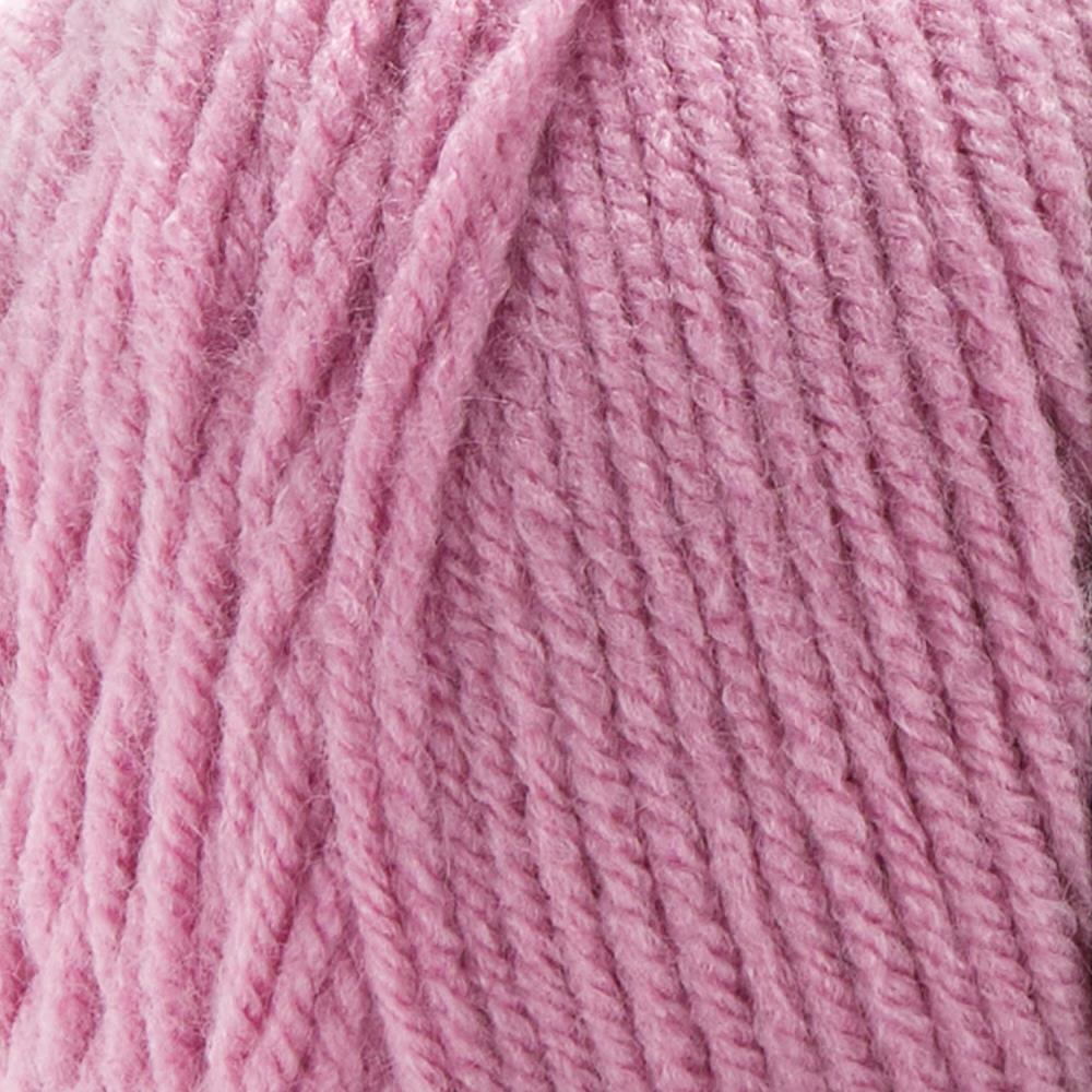 Close-up of pink yarn with a textured surface